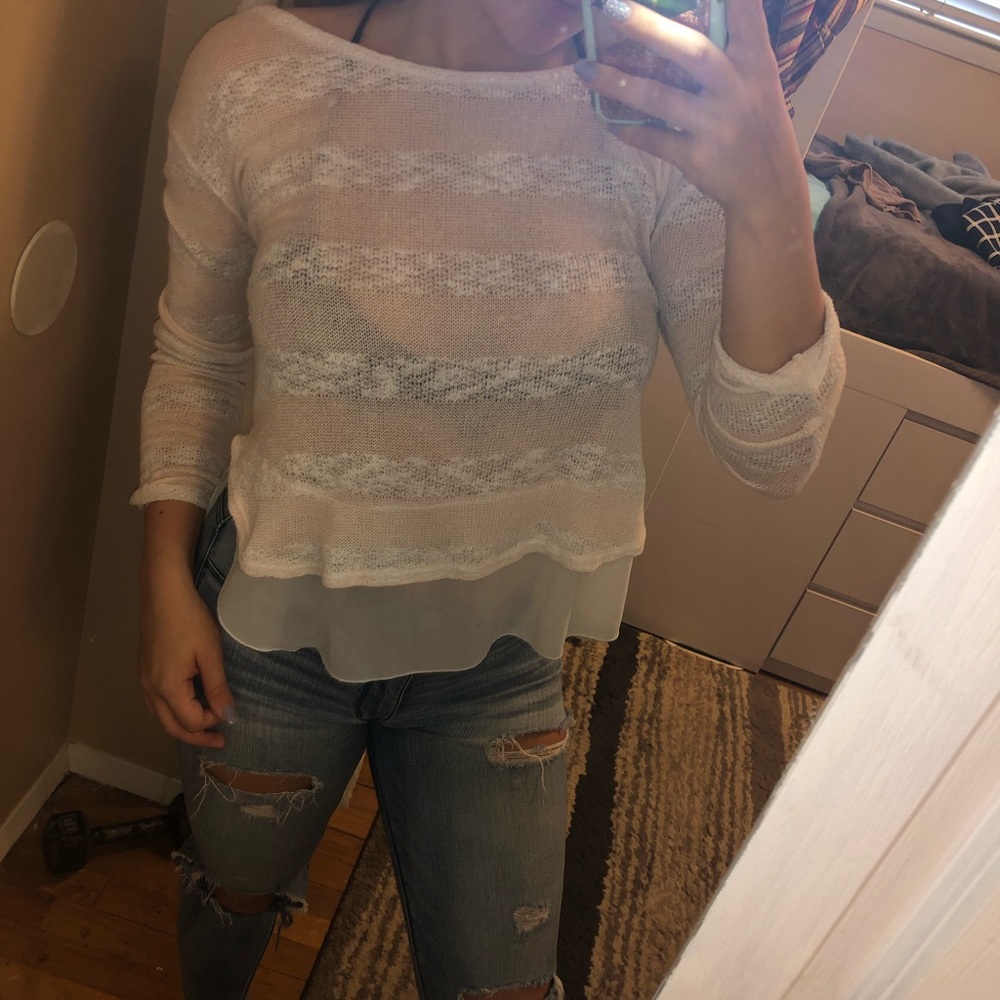 Pink and white sweater with lace underlay